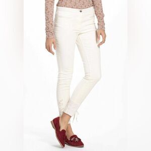 Cream skinny pants with ribbon detail
